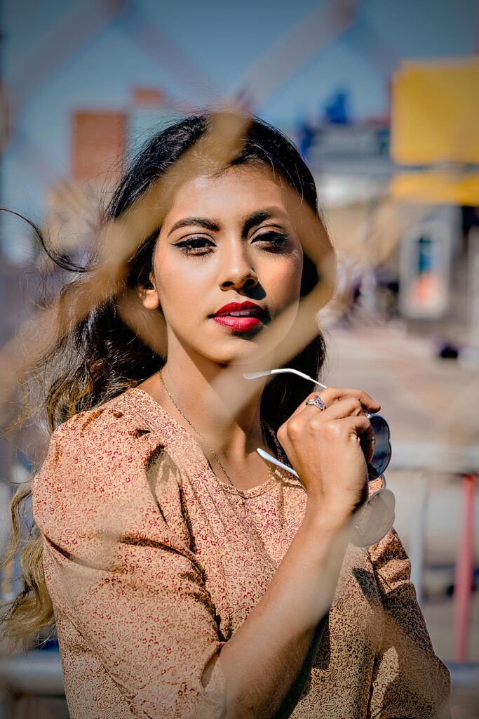 Photo Of Woman Near Chain Link Fence