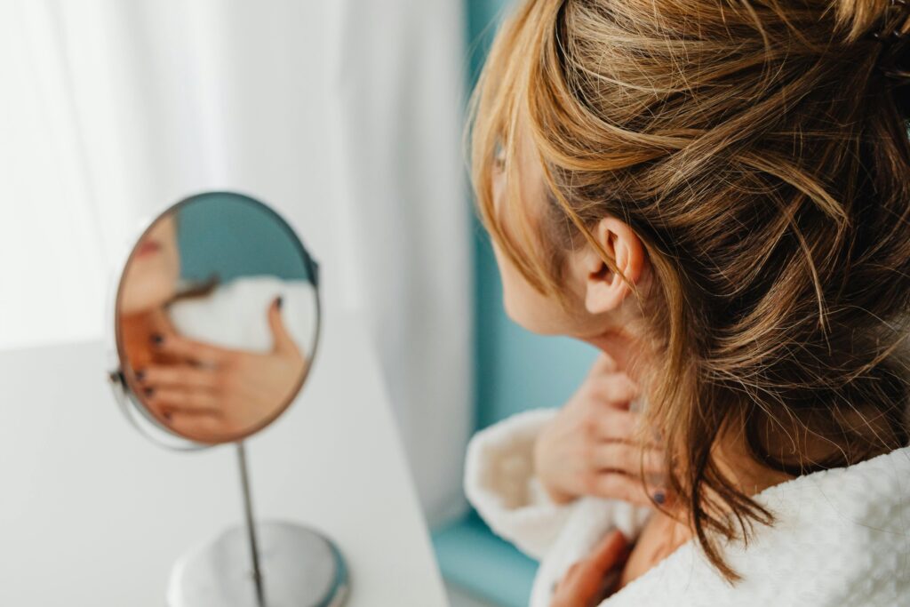 Woman Applying a Skincare Product